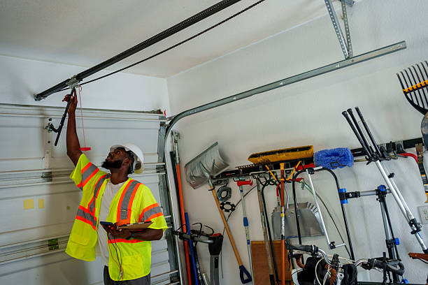 Professional Garage Door Panel Replacement technician working in Harper Woods, MI